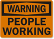 People Working Warning Sign