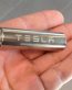 elon tesla battery on iand sticker