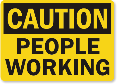 People Working Caution Sign