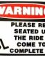 Remain Seated Funny Warning Sticker